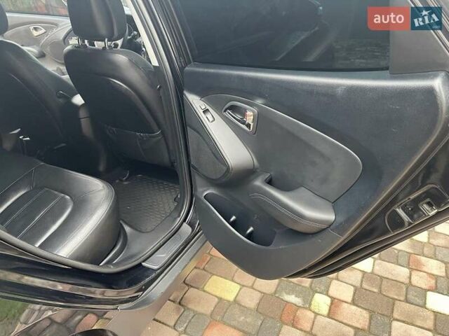Чорний Хендай іх35, об'ємом двигуна 2 л та пробігом 210 тис. км за 12700 $, фото 10 на Automoto.ua
