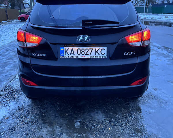Чорний Хендай іх35, об'ємом двигуна 2 л та пробігом 252 тис. км за 11000 $, фото 3 на Automoto.ua