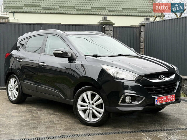 Чорний Хендай іх35, об'ємом двигуна 2 л та пробігом 206 тис. км за 13099 $, фото 10 на Automoto.ua