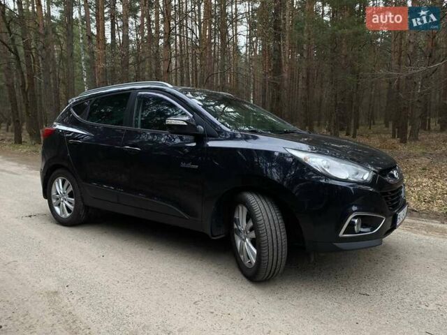 Черный Хендай их35, объемом двигателя 1.69 л и пробегом 290 тыс. км за 10999 $, фото 11 на Automoto.ua