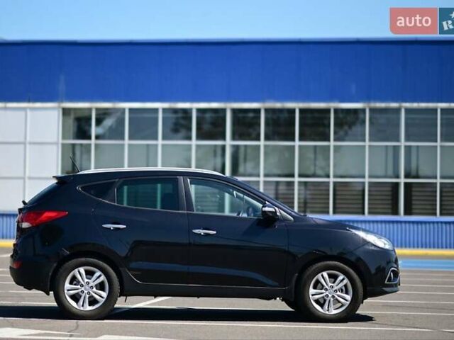 Чорний Хендай іх35, об'ємом двигуна 2 л та пробігом 226 тис. км за 10990 $, фото 3 на Automoto.ua