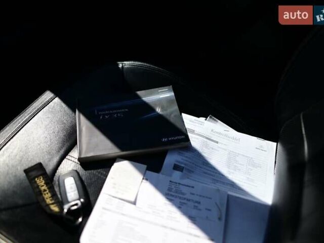 Чорний Хендай іх35, об'ємом двигуна 2 л та пробігом 226 тис. км за 10990 $, фото 26 на Automoto.ua