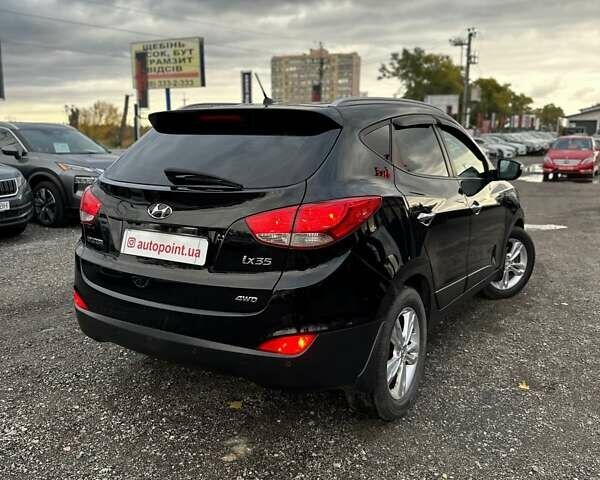 Черный Хендай их35, объемом двигателя 2 л и пробегом 157 тыс. км за 12700 $, фото 7 на Automoto.ua