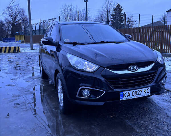 Чорний Хендай іх35, об'ємом двигуна 2 л та пробігом 252 тис. км за 11000 $, фото 4 на Automoto.ua