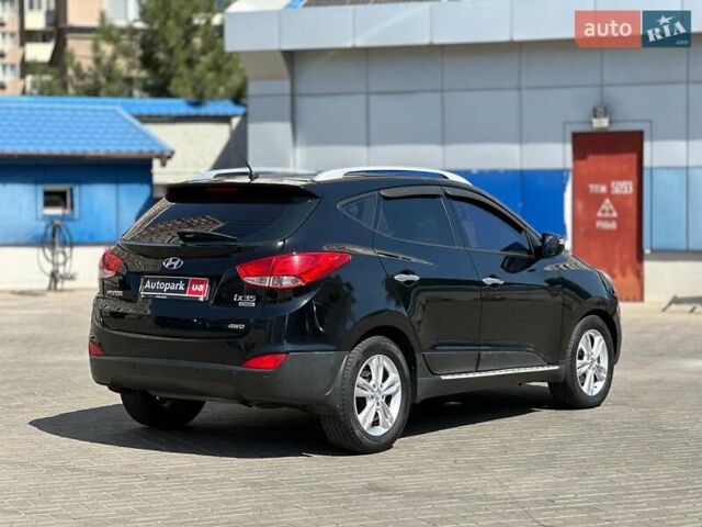 Черный Хендай их35, объемом двигателя 2 л и пробегом 218 тыс. км за 12230 $, фото 4 на Automoto.ua