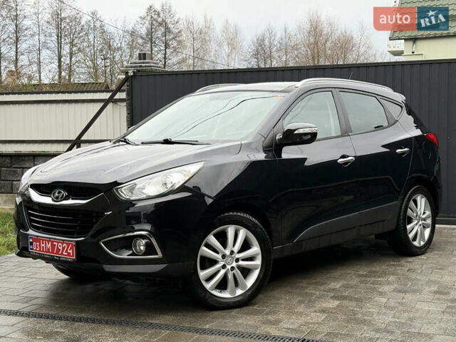 Чорний Хендай іх35, об'ємом двигуна 2 л та пробігом 206 тис. км за 13099 $, фото 25 на Automoto.ua