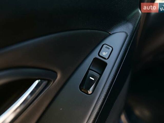 Чорний Хендай іх35, об'ємом двигуна 2 л та пробігом 226 тис. км за 10990 $, фото 10 на Automoto.ua