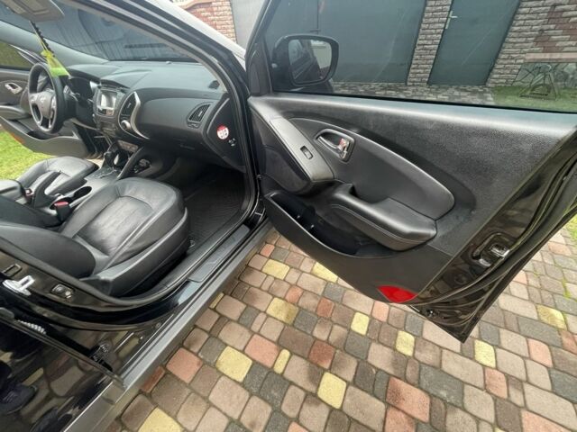 Чорний Хендай іх35, об'ємом двигуна 2 л та пробігом 210 тис. км за 12700 $, фото 7 на Automoto.ua