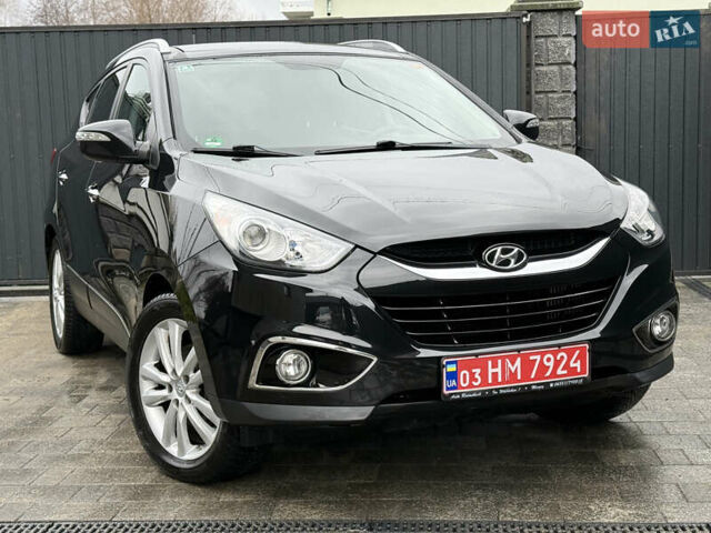 Чорний Хендай іх35, об'ємом двигуна 2 л та пробігом 206 тис. км за 13099 $, фото 6 на Automoto.ua