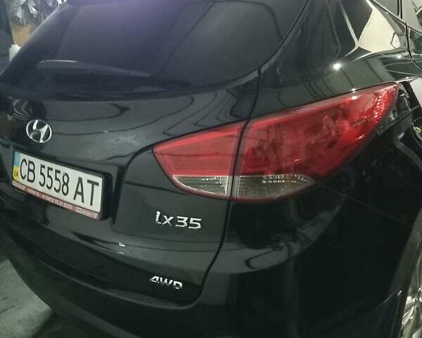 Чорний Хендай іх35, об'ємом двигуна 2 л та пробігом 157 тис. км за 12000 $, фото 19 на Automoto.ua