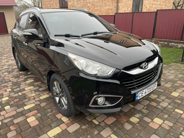 Чорний Хендай іх35, об'ємом двигуна 2 л та пробігом 210 тис. км за 12700 $, фото 1 на Automoto.ua