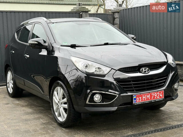 Чорний Хендай іх35, об'ємом двигуна 2 л та пробігом 206 тис. км за 13099 $, фото 12 на Automoto.ua