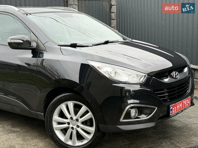 Чорний Хендай іх35, об'ємом двигуна 2 л та пробігом 206 тис. км за 13099 $, фото 5 на Automoto.ua