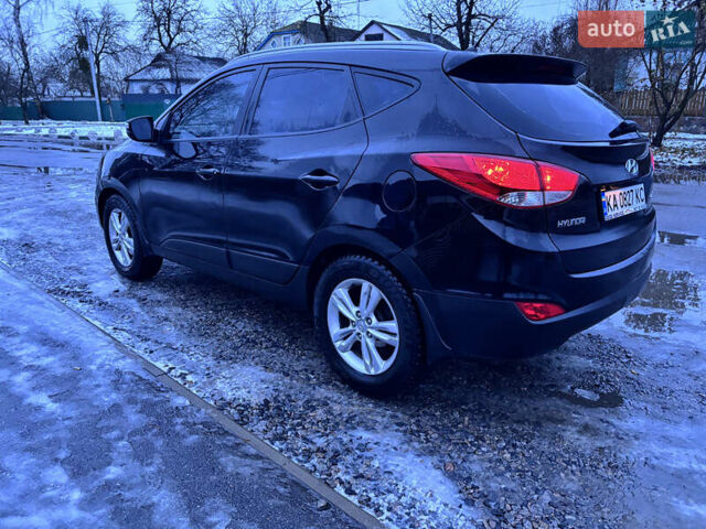 Чорний Хендай іх35, об'ємом двигуна 2 л та пробігом 252 тис. км за 11000 $, фото 2 на Automoto.ua