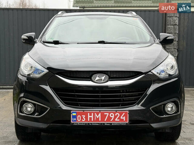 Чорний Хендай іх35, об'ємом двигуна 2 л та пробігом 206 тис. км за 13099 $, фото 11 на Automoto.ua