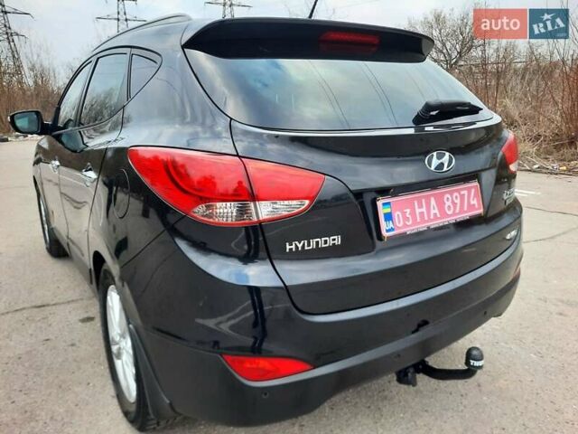 Чорний Хендай іх35, об'ємом двигуна 2 л та пробігом 211 тис. км за 12700 $, фото 84 на Automoto.ua