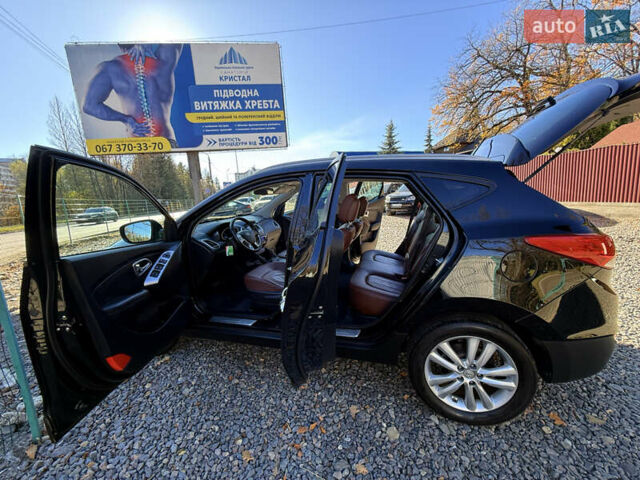 Чорний Хендай іх35, об'ємом двигуна 2 л та пробігом 153 тис. км за 13999 $, фото 51 на Automoto.ua