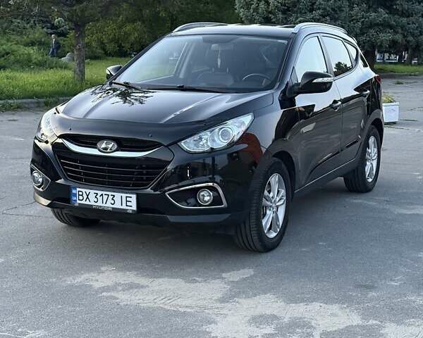 Чорний Хендай іх35, об'ємом двигуна 2 л та пробігом 173 тис. км за 13800 $, фото 11 на Automoto.ua