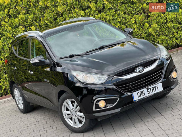 Черный Хендай их35, объемом двигателя 1.69 л и пробегом 238 тыс. км за 11999 $, фото 5 на Automoto.ua