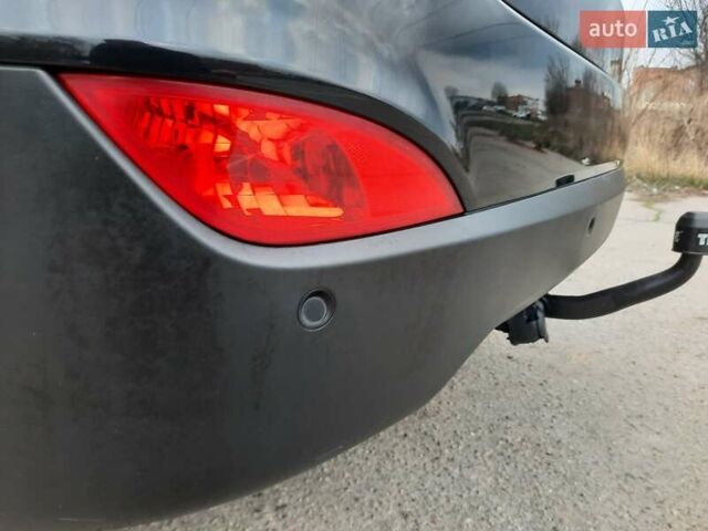 Чорний Хендай іх35, об'ємом двигуна 2 л та пробігом 211 тис. км за 12700 $, фото 88 на Automoto.ua