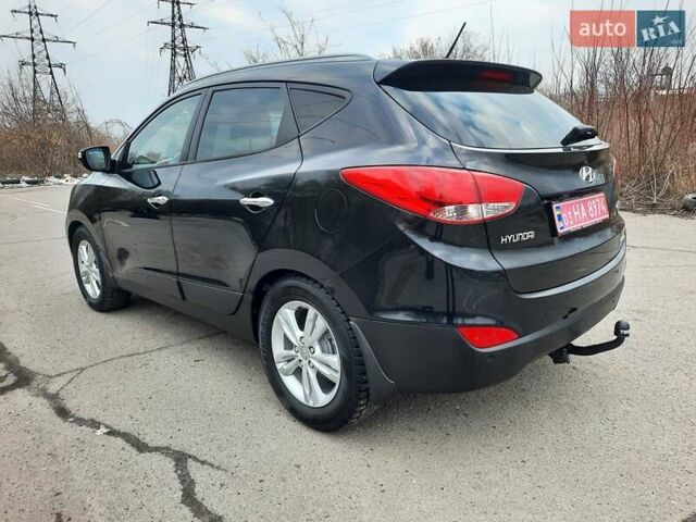 Чорний Хендай іх35, об'ємом двигуна 2 л та пробігом 211 тис. км за 12700 $, фото 12 на Automoto.ua