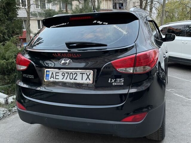 Черный Хендай их35, объемом двигателя 1.7 л и пробегом 272 тыс. км за 13500 $, фото 3 на Automoto.ua