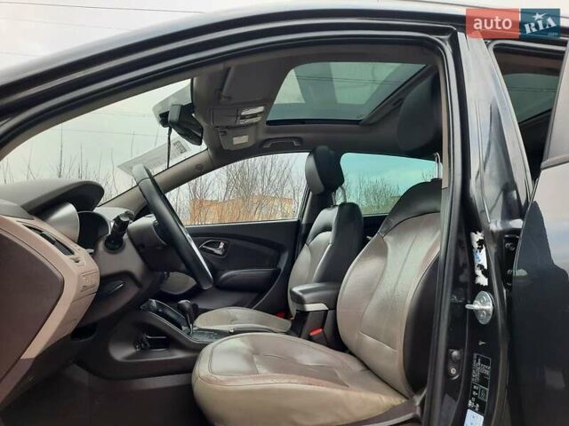 Чорний Хендай іх35, об'ємом двигуна 2 л та пробігом 211 тис. км за 12700 $, фото 65 на Automoto.ua