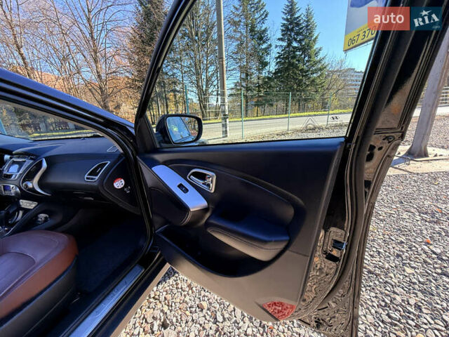 Чорний Хендай іх35, об'ємом двигуна 2 л та пробігом 153 тис. км за 13999 $, фото 64 на Automoto.ua