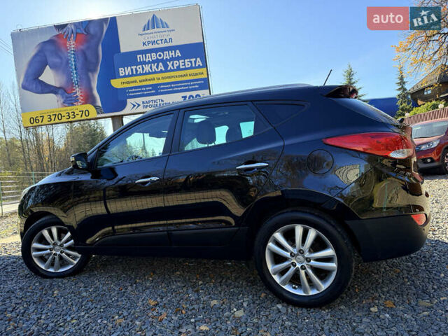 Чорний Хендай іх35, об'ємом двигуна 2 л та пробігом 153 тис. км за 13999 $, фото 22 на Automoto.ua