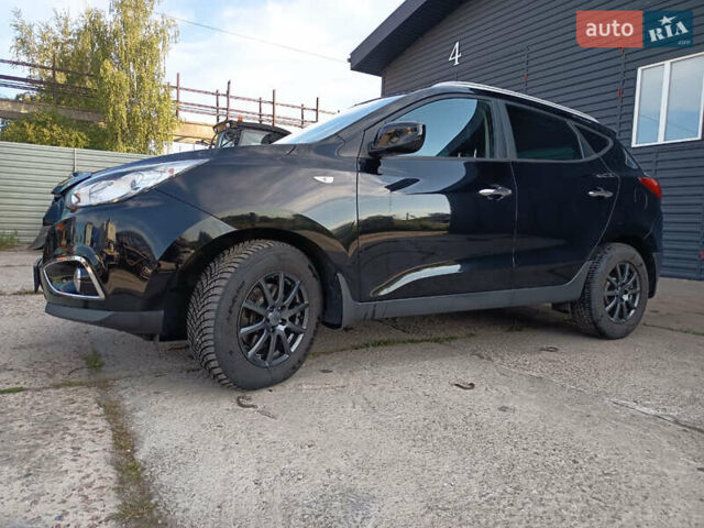 Черный Хендай их35, объемом двигателя 2 л и пробегом 195 тыс. км за 12600 $, фото 8 на Automoto.ua