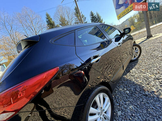 Чорний Хендай іх35, об'ємом двигуна 2 л та пробігом 153 тис. км за 13999 $, фото 14 на Automoto.ua