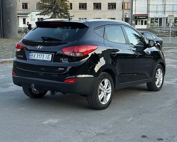 Чорний Хендай іх35, об'ємом двигуна 2 л та пробігом 173 тис. км за 13800 $, фото 16 на Automoto.ua