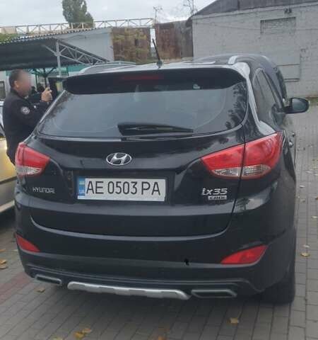 Чорний Хендай іх35, об'ємом двигуна 2 л та пробігом 148 тис. км за 12800 $, фото 6 на Automoto.ua