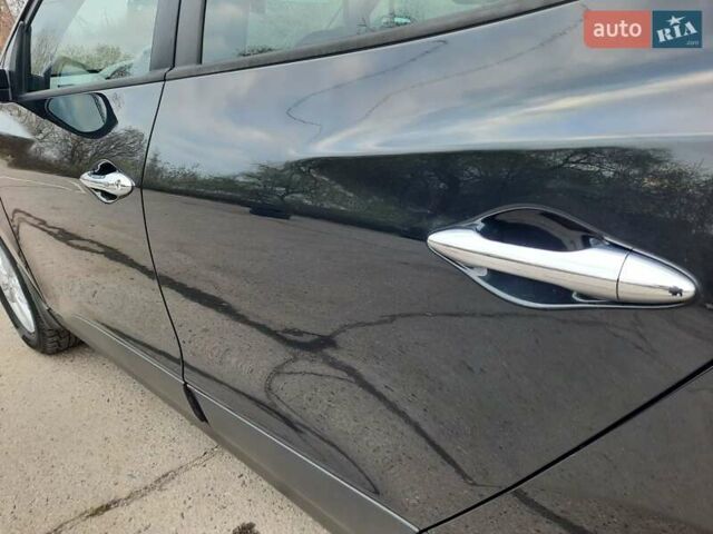 Чорний Хендай іх35, об'ємом двигуна 2 л та пробігом 211 тис. км за 12700 $, фото 70 на Automoto.ua