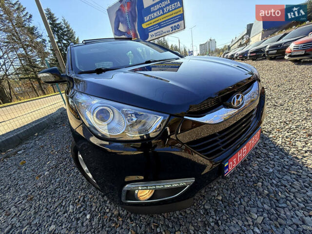 Чорний Хендай іх35, об'ємом двигуна 2 л та пробігом 153 тис. км за 13999 $, фото 6 на Automoto.ua