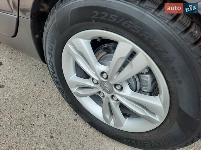 Чорний Хендай іх35, об'ємом двигуна 2 л та пробігом 211 тис. км за 12700 $, фото 83 на Automoto.ua