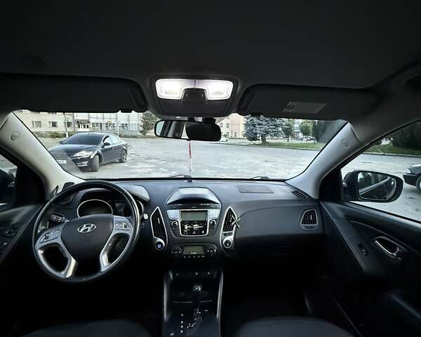 Чорний Хендай іх35, об'ємом двигуна 2 л та пробігом 173 тис. км за 13800 $, фото 25 на Automoto.ua