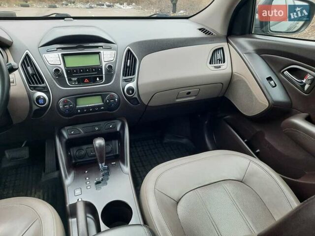 Чорний Хендай іх35, об'ємом двигуна 2 л та пробігом 211 тис. км за 12700 $, фото 68 на Automoto.ua