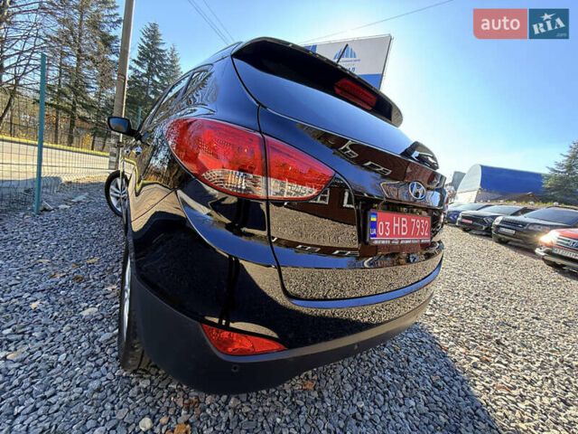 Чорний Хендай іх35, об'ємом двигуна 2 л та пробігом 153 тис. км за 13999 $, фото 17 на Automoto.ua