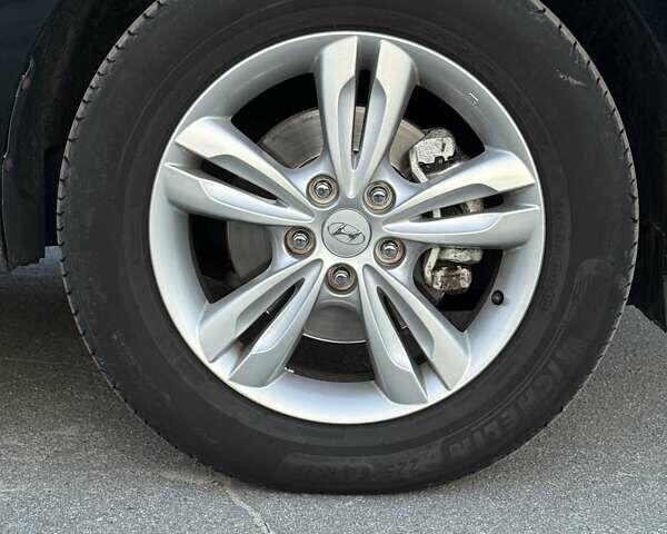 Чорний Хендай іх35, об'ємом двигуна 2 л та пробігом 173 тис. км за 13800 $, фото 26 на Automoto.ua