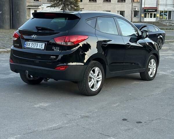Чорний Хендай іх35, об'ємом двигуна 2 л та пробігом 173 тис. км за 13800 $, фото 17 на Automoto.ua