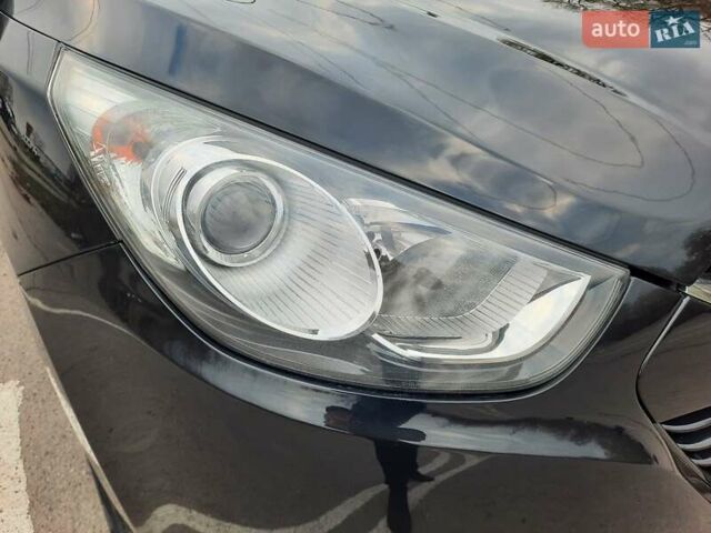 Чорний Хендай іх35, об'ємом двигуна 2 л та пробігом 211 тис. км за 12700 $, фото 22 на Automoto.ua
