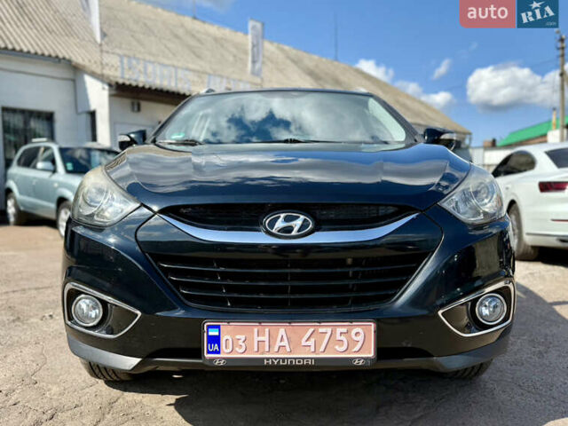 Чорний Хендай іх35, об'ємом двигуна 2 л та пробігом 253 тис. км за 13000 $, фото 13 на Automoto.ua