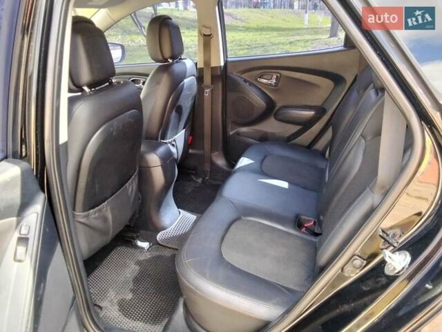 Чорний Хендай іх35, об'ємом двигуна 2 л та пробігом 180 тис. км за 12999 $, фото 9 на Automoto.ua