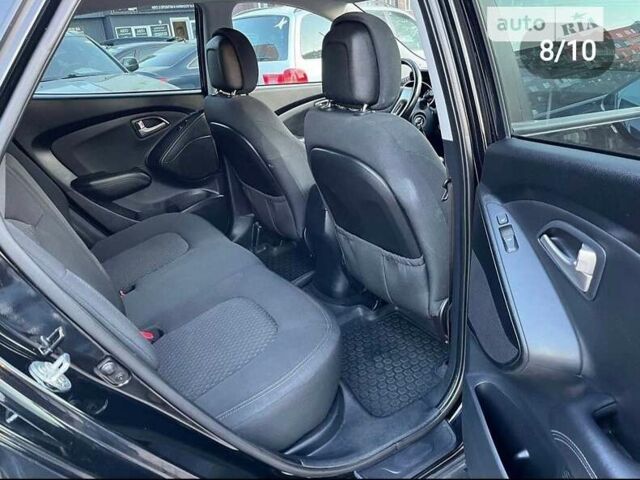 Чорний Хендай іх35, об'ємом двигуна 2 л та пробігом 148 тис. км за 12800 $, фото 5 на Automoto.ua