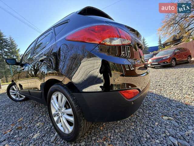 Чорний Хендай іх35, об'ємом двигуна 2 л та пробігом 153 тис. км за 13999 $, фото 20 на Automoto.ua