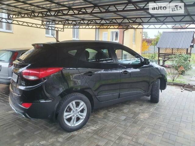 Чорний Хендай іх35, об'ємом двигуна 2 л та пробігом 148 тис. км за 12800 $, фото 3 на Automoto.ua