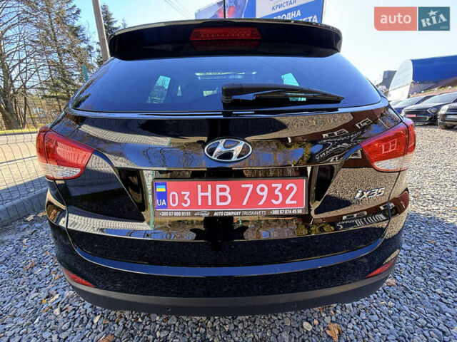 Чорний Хендай іх35, об'ємом двигуна 2 л та пробігом 153 тис. км за 13999 $, фото 15 на Automoto.ua