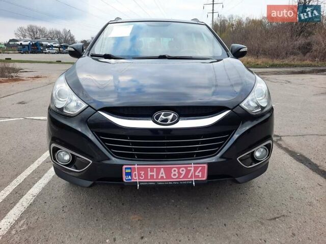 Чорний Хендай іх35, об'ємом двигуна 2 л та пробігом 211 тис. км за 12700 $, фото 26 на Automoto.ua