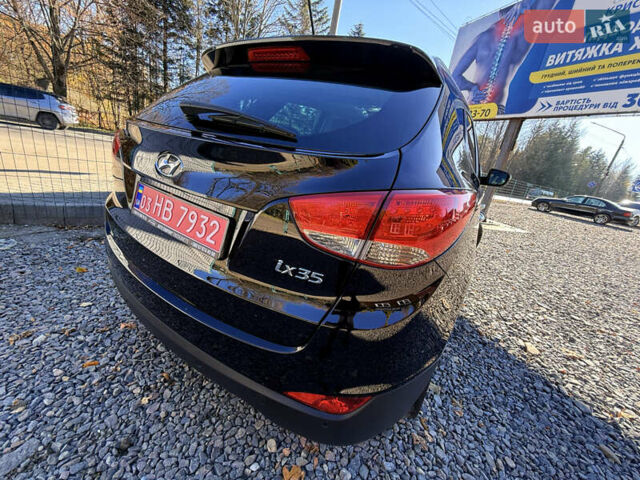 Чорний Хендай іх35, об'ємом двигуна 2 л та пробігом 153 тис. км за 13999 $, фото 16 на Automoto.ua